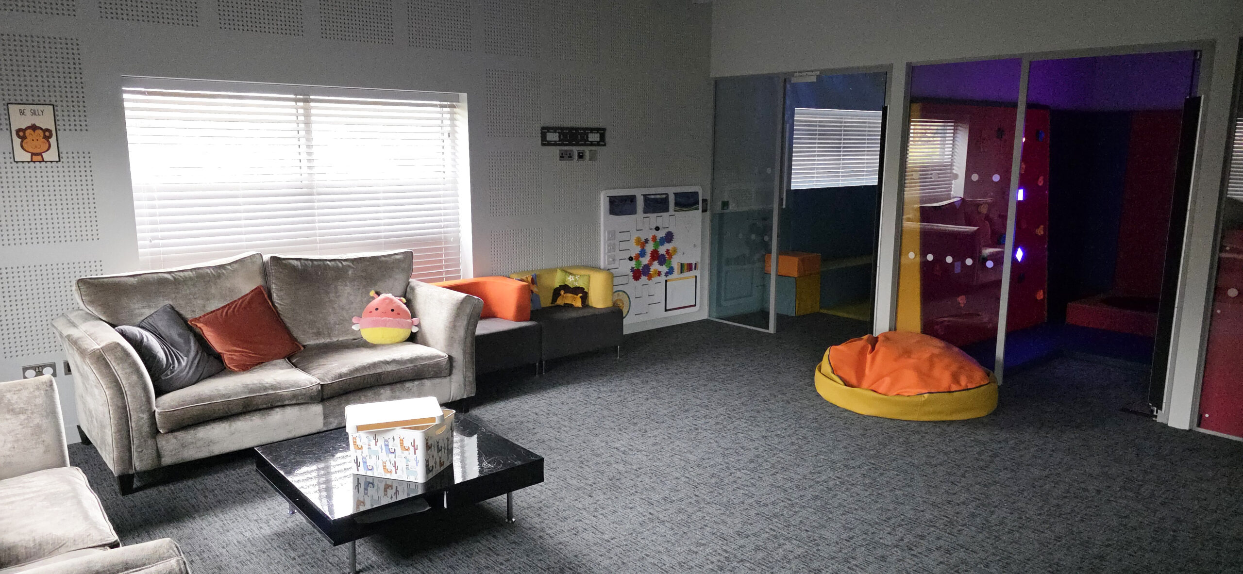 Explorium sensory room with comfortable seating areas